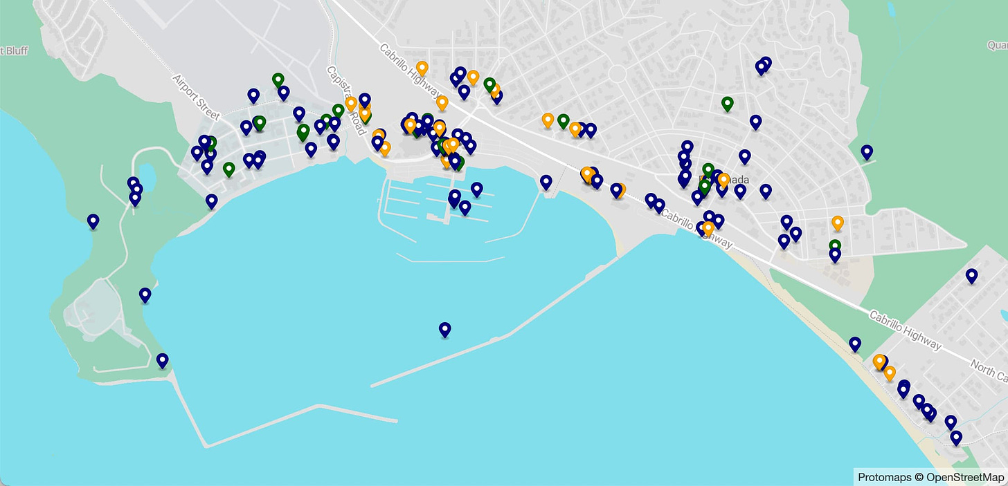 A vector map of El Granada showing the area around the harbor, with lots of little markers for different businesses. Protomaps (c) OpenStreetMap in the corner.