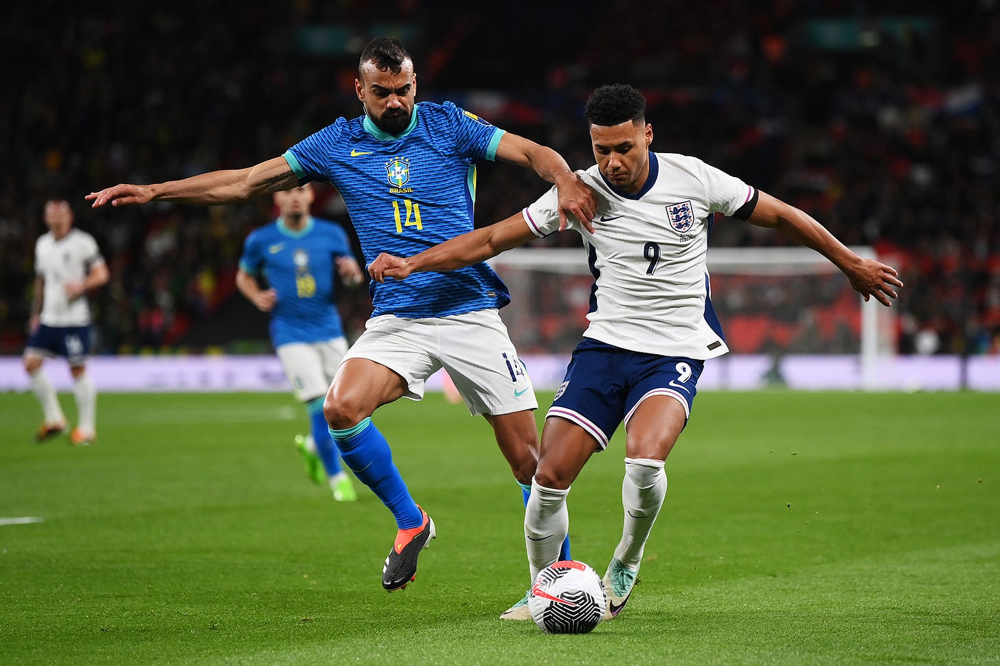 Brazil defender Fabricio Bruno pictured (left) challenging England's Ollie Watkins for the ball during an international friendly at Wembley in March 2024