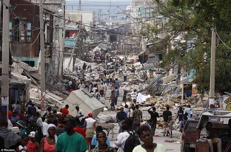 Haiti earthquake in pictures: Shell-shocked survivors roam streets ...