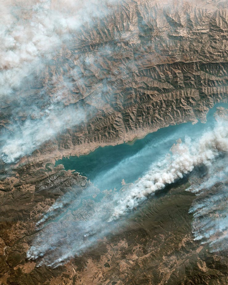 Smoke from wildfires over Lake Berryessa, California, USA