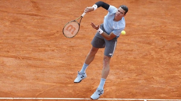 milos raonic beats juan monaco for madrid open 2015