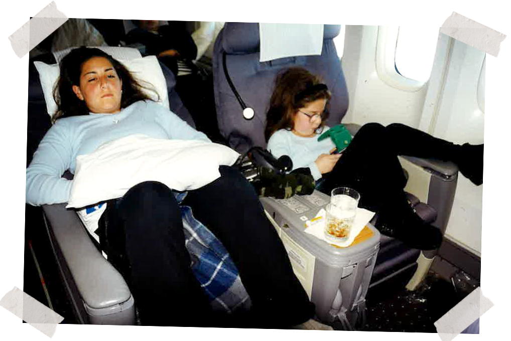 Me, left, and Natalie on an international flight in First Class, late 1990s.