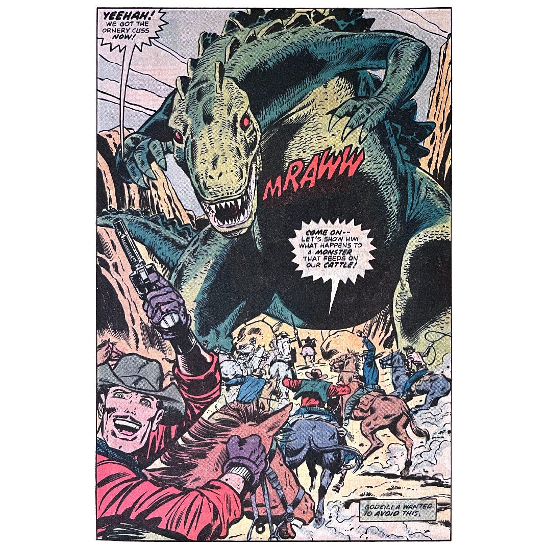 Mid-issue splash page from this issue showing a bunch of cowboys on horses charging toward Godzilla. One cowboy says, “Yeehah! We got the ornery cuss now!” Another says, “Come on — let’s show him what happens to a monster that feeds on our cattle!” Godzilla says, “Mraww.” Narration reads, “Godzilla wanted to avoid this.”