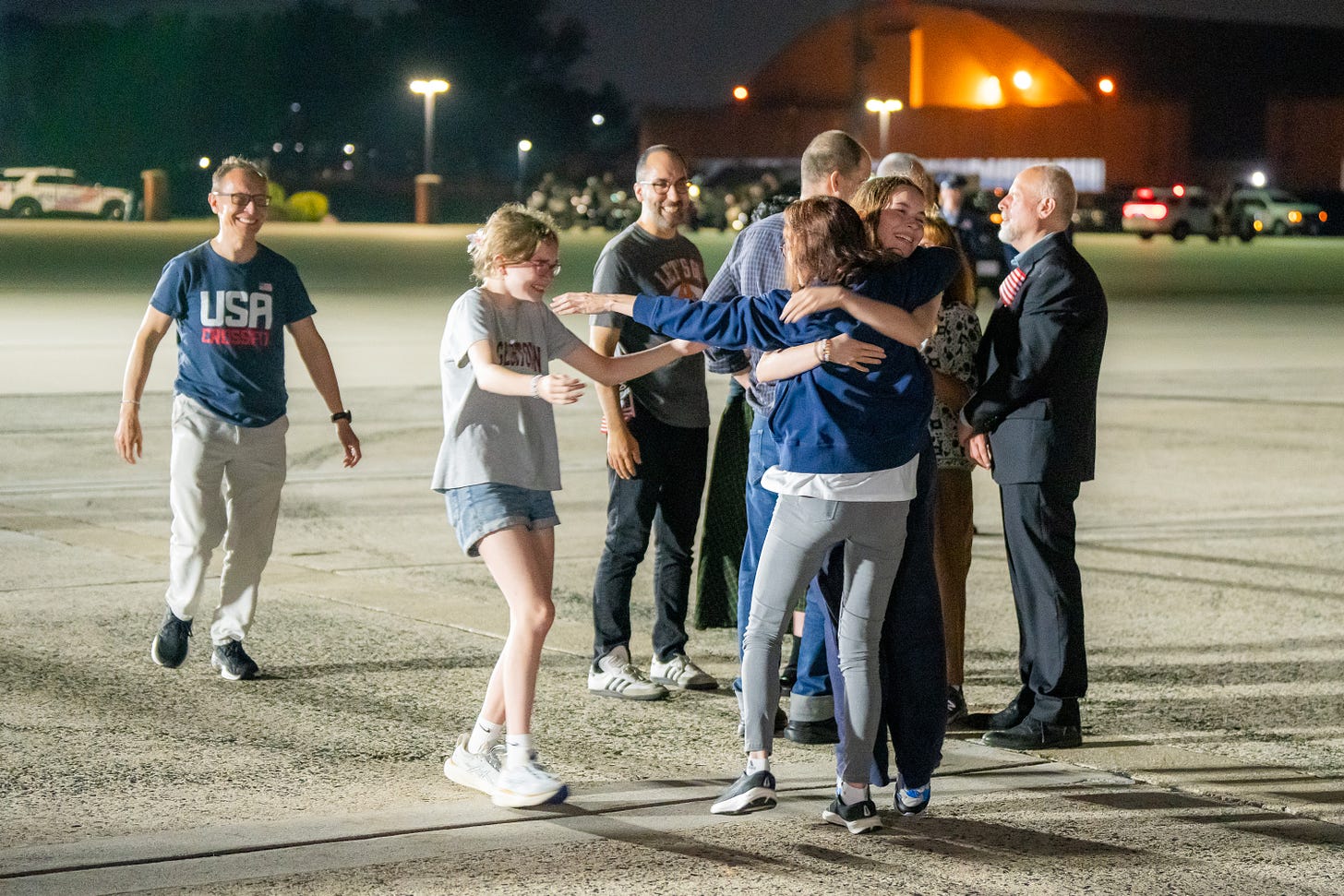 President Biden greets Americans previously detained in Russia on the tarmac of Joint Base Andrews.