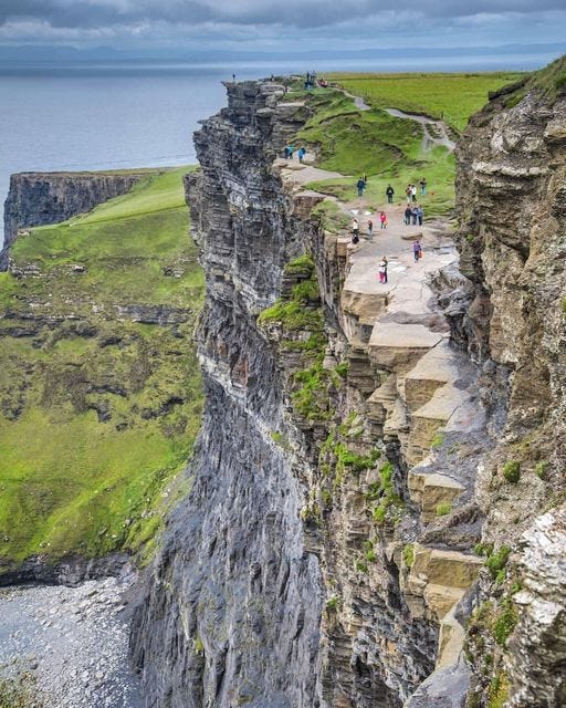 May be an image of 6 people and the Carrick-a-Rede Rope Bridge Inspire A Trip To Ireland In 2024