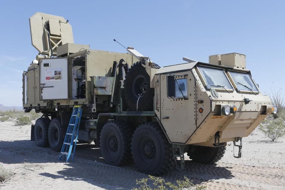 Heavy truck with flat antenna on top