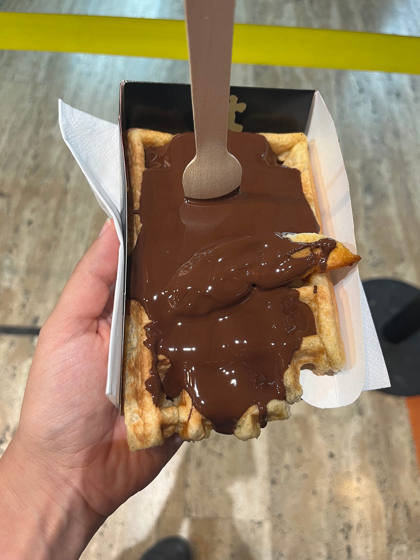 gluten-free waffle covered in chocoalte from veganwaf in brussels