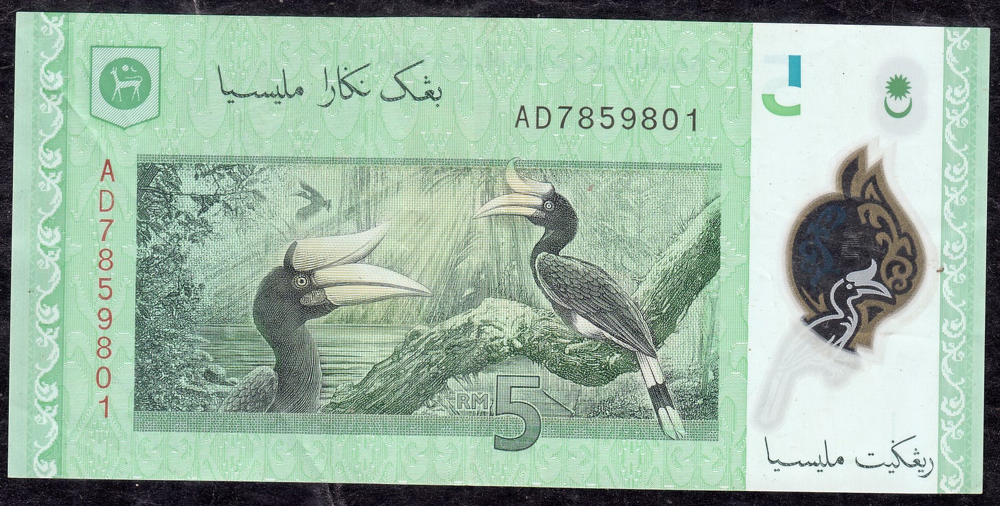 2012 Malaysia 5 Ringgit "Rhinoceros Hornbill (Buceros rhinoceros) birds"  Polymer Banknote {AD7859801} ~~ EXTRA