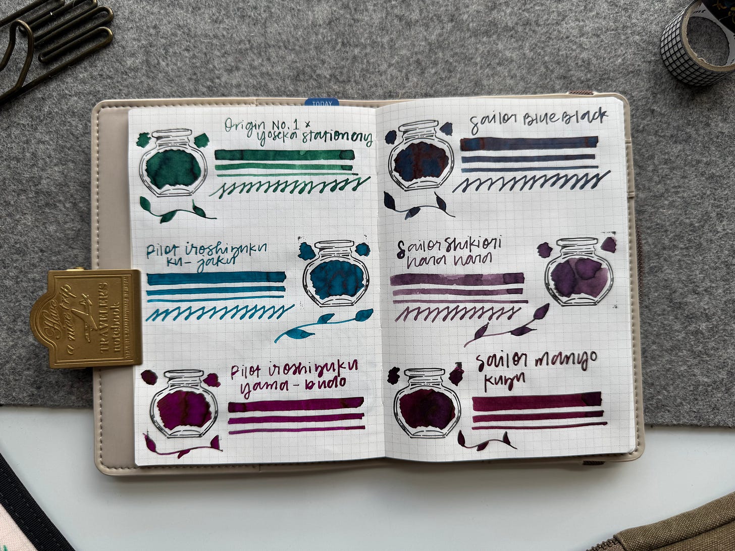 A6 Hobonichi Grid Notebook open to show six ink swatches (3 on each page). On the left: Origin No. 1 X Yoseka Stationery (Green ink), Pilot Iroshizuku Ku-Jaku (Blue-Green), Pilot Iroshizuku Yama-Budo (dark pink). On the right: Sailor Blue Black (blue black), Sailor Shikiori Hara-hara (dusty purple), Sailor Manyo Kuzu (Dark port red). 
