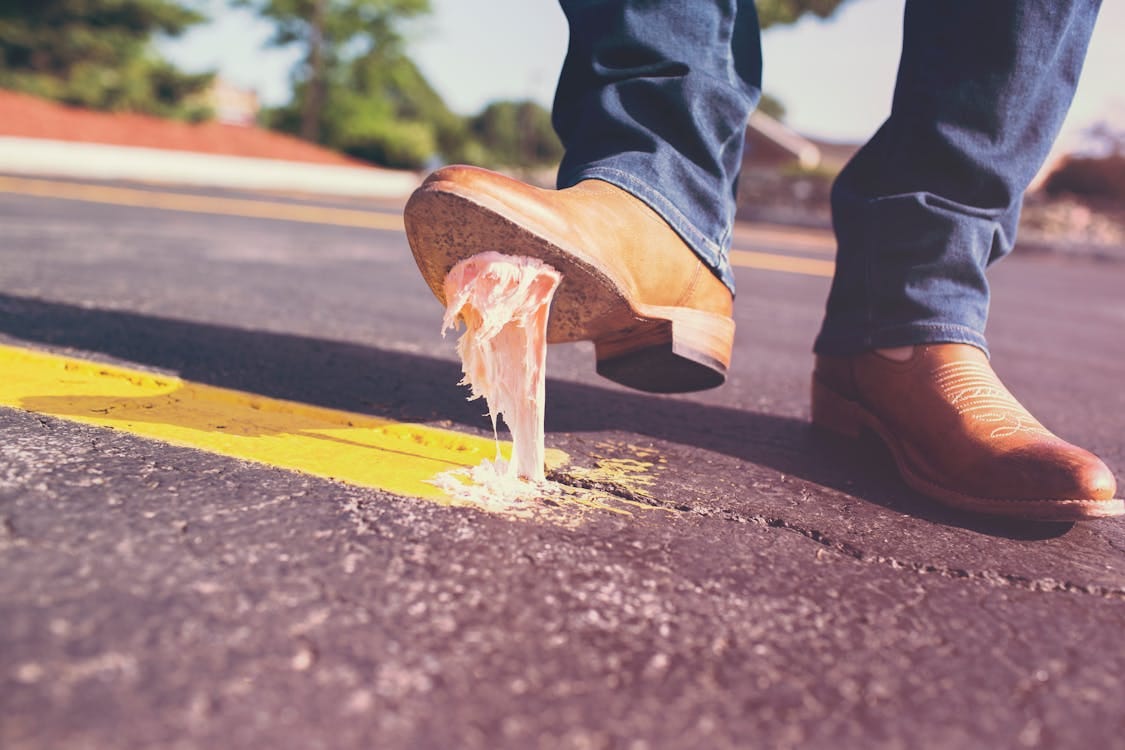 Free Person Stepped on Gum Stock Photo