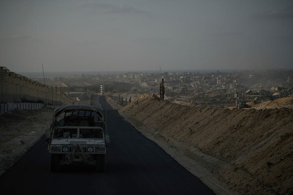 Israeli soldiers move on the Philadelphi Corridor along the border with Egypt, in the Gaza Strip on September 13, 2024. (AP)