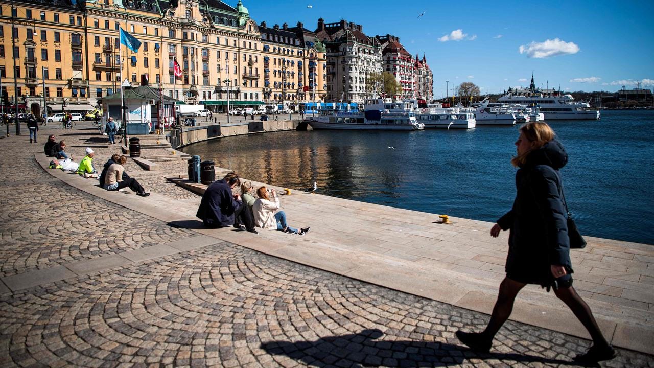 Swedes enjoy the outdoors at Nybroplan in Stockholm in April 2020 during the pandemic. Picture: AFP