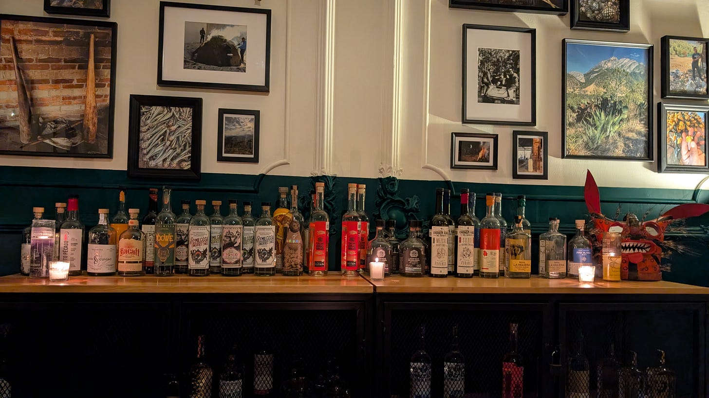 Gorgeous display of mezcal bottles inside Salon dé Agavé in Mexico City.