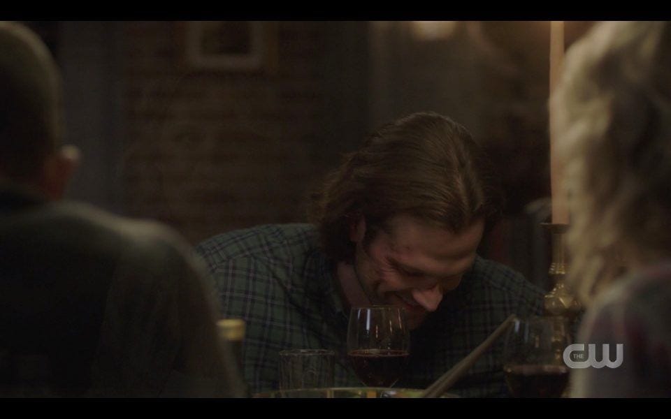 sam winchester laughing with dean john mary at dinner spn lebanon