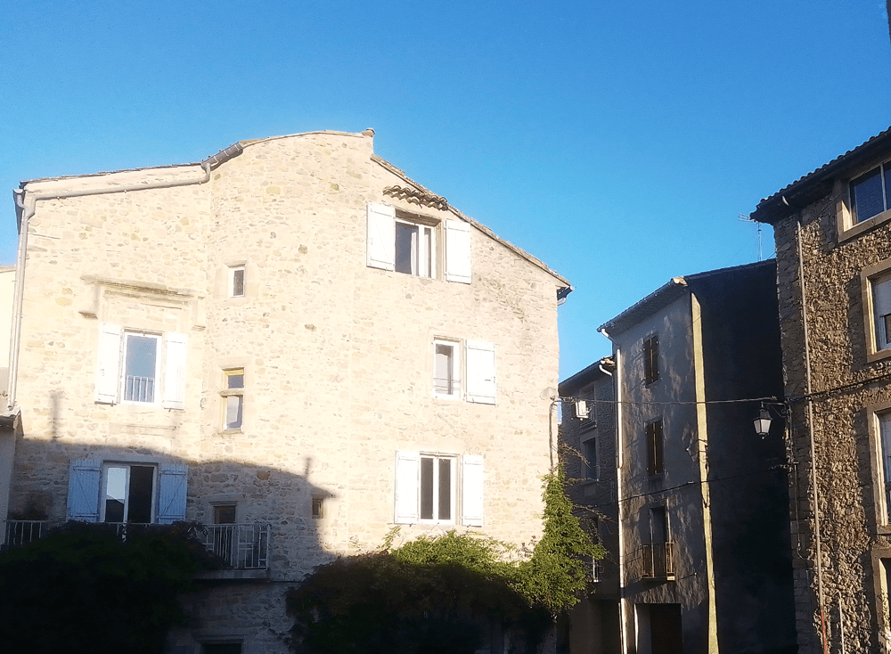 Stone buildings glow in morning sunshine. Hérépian, 34, September 29, 2023. (c) Chris Aspinall