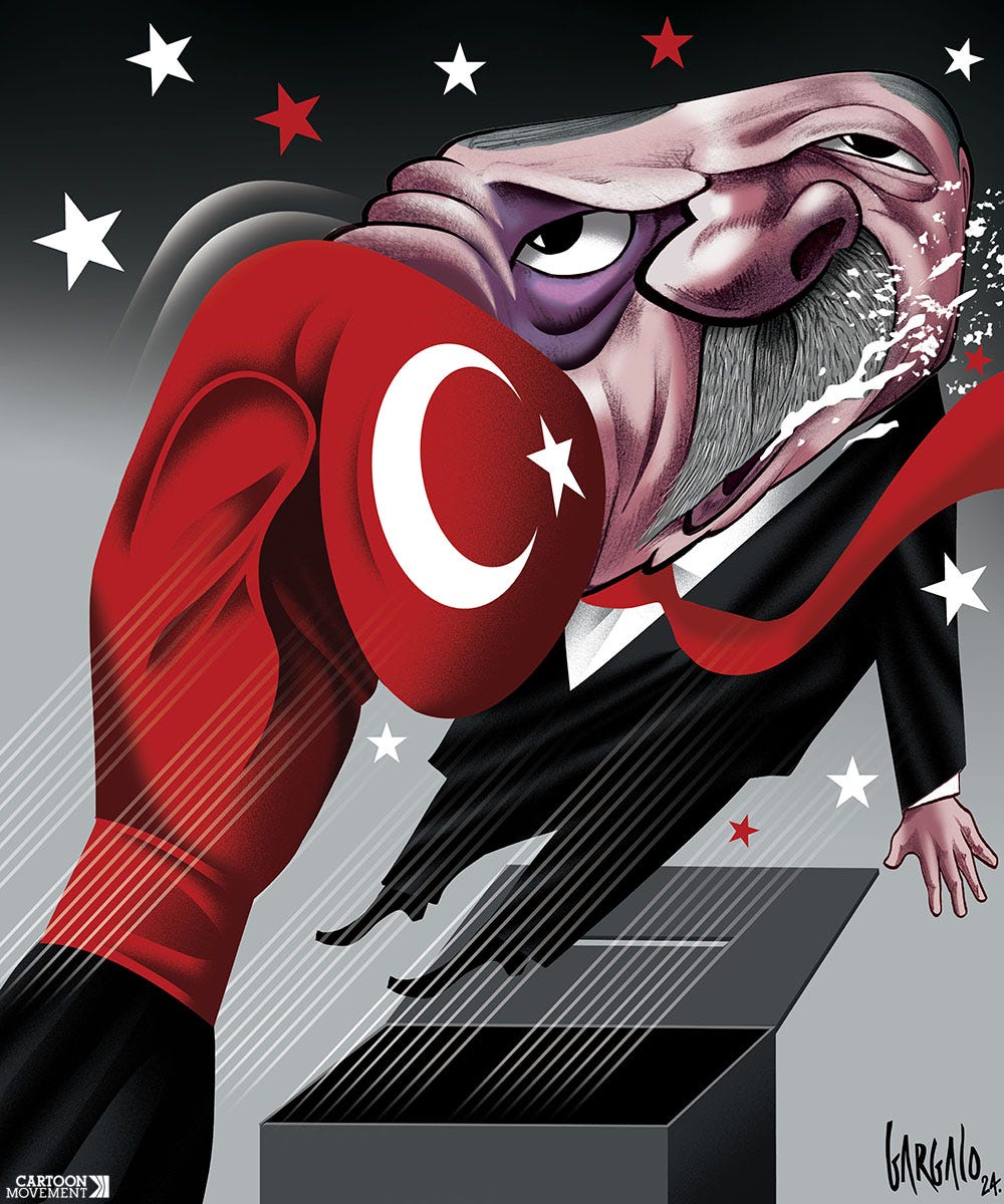 Cartoons showing Erdogan getting hit in the face by a giant boxing glove with the flag of Turkey on it.
