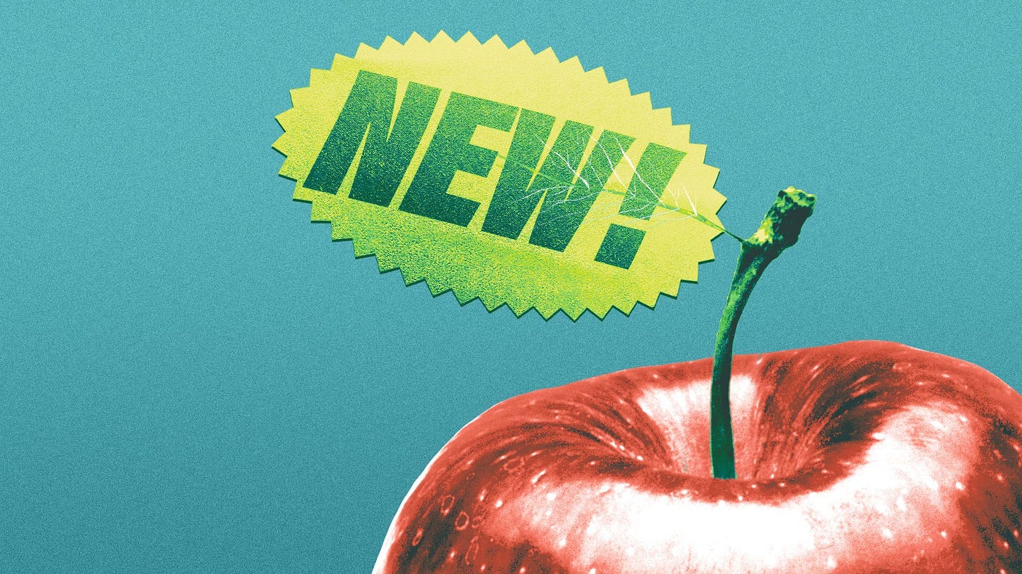 Illustration of an apple with a sticker reading NEW! instead of a leaf. 