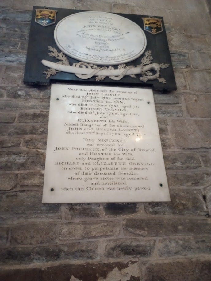 Two part memorial plaques on abbey wall