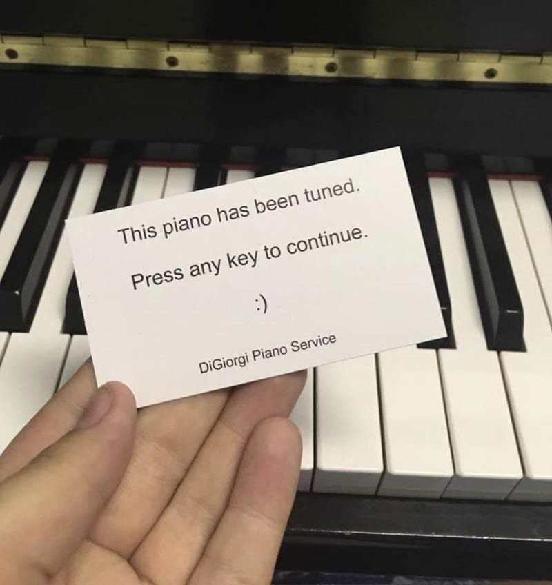 A card from a piano tuner, reading:

   This piano has been tuned.
    Press any key to continue.