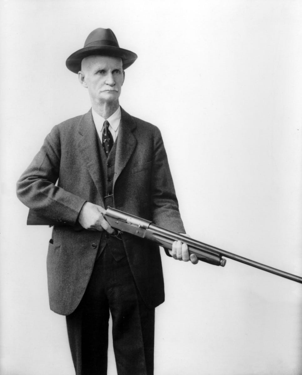 File:John M. Browning with his Auto 5 shotgun (2).jpg - Wikimedia Commons