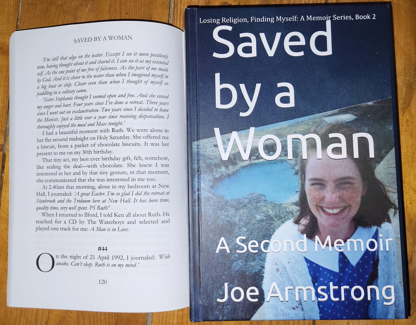 Cover of Saved by a Woman, with an open page recording Joe Armstrong's experience of falling in love with Ruth.