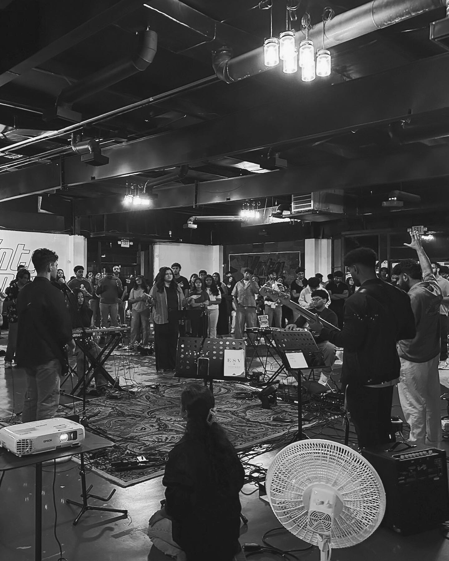 South Asian students worshipping at a gathering in Houston