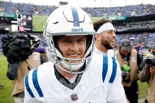 Matt Gay of the Indianapolis Colts celebrates after kicking the game-winning field goal to beat the Baltimore Ravens in overtime at M&T Bank Stadium...