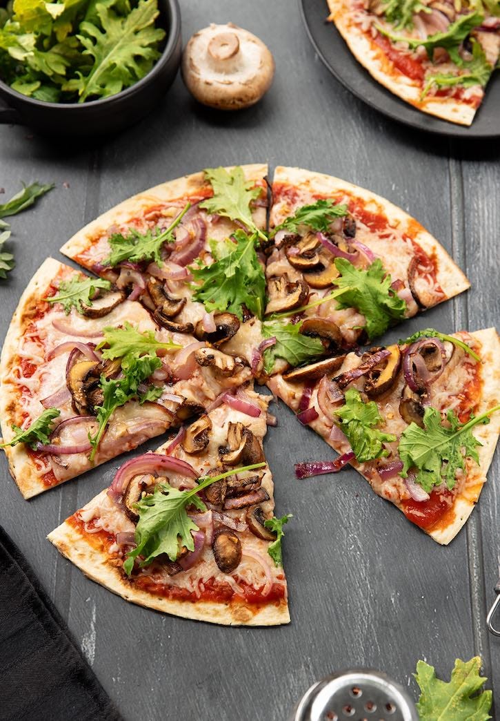 Kale, Red Onion, and Mushroom pizza