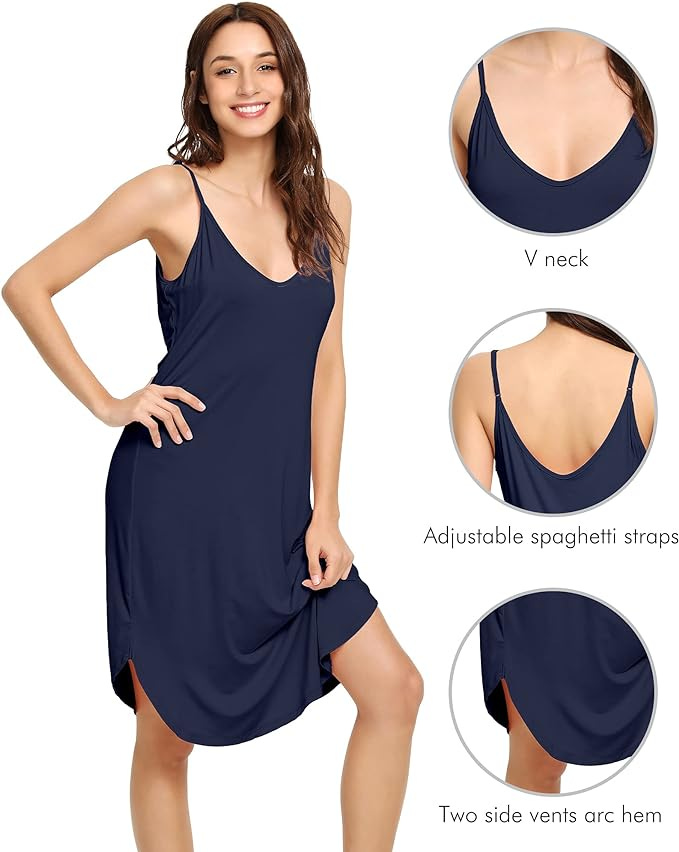 Knee length navy blue bamboo nightgown, with spaghetti straps being worn by a brunette woman
