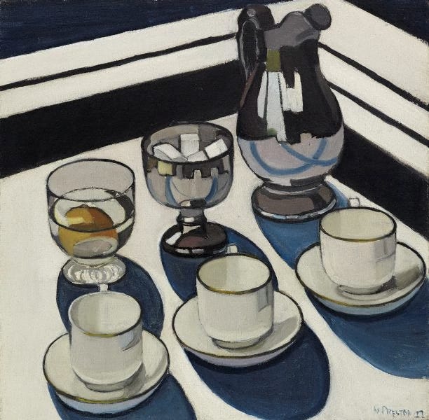 Margaret Preston’s painting, Implement Blue. A strongly lit still life composition of three cups and saucers, two stemmed glasses, and a pitcher, all of which cast dark blue shadows on a cream surface. The objects are outlined in black with a stark, geometric, modernist feeling. One glass contains a submerged lemon; another glass, cubes of ice. Behind the objects are black lines which meet in an angle towards the top right of the image and frame the central composition: perhaps representing the edge of a table or tray.