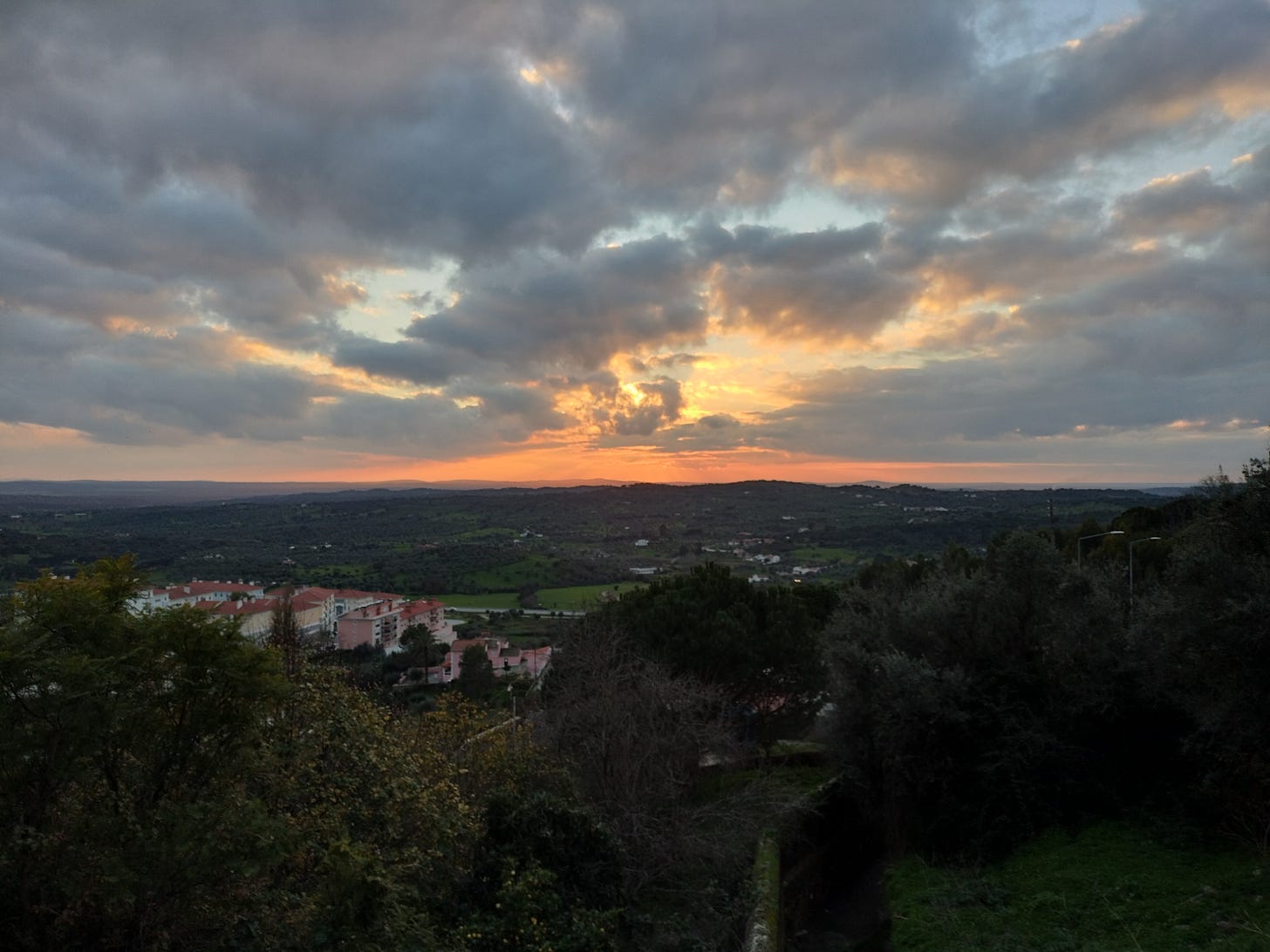 a cloudy sunset viwed from Portalegre, looking south from the edge of the city