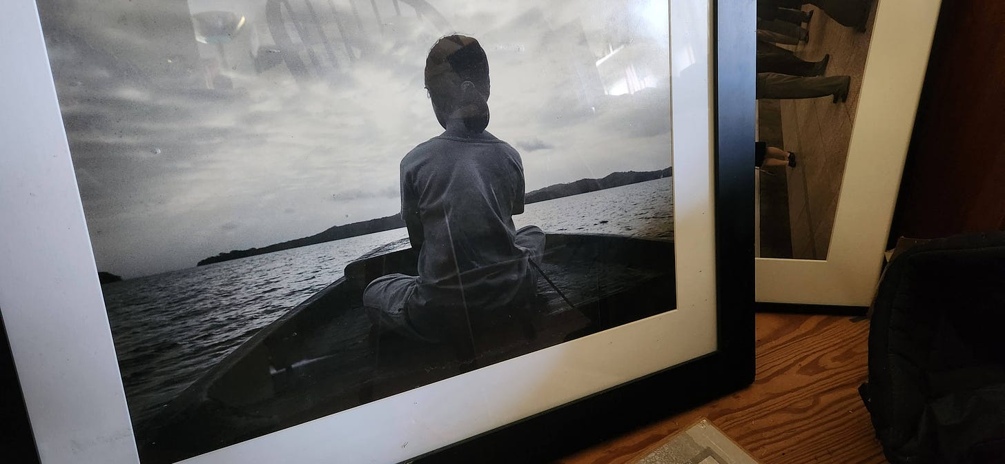 photo of girl rowing a boat