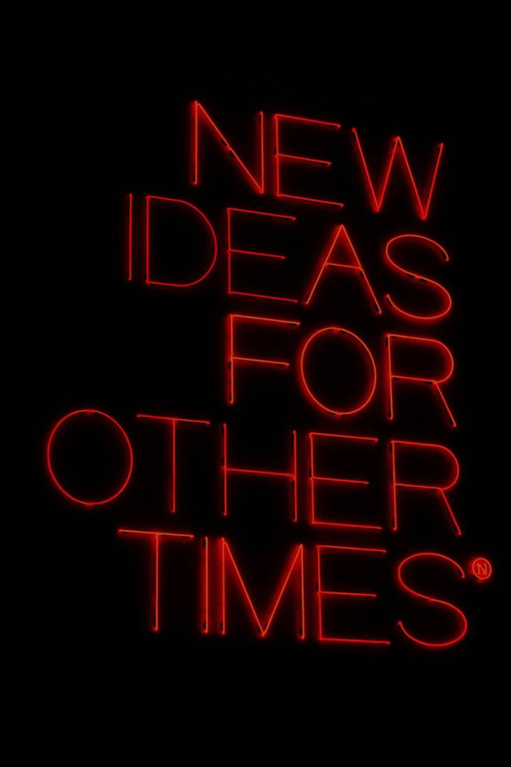 A red neon sign with white text

AI-generated content may be incorrect.