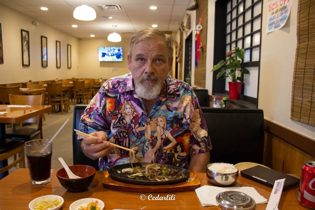 The First Reader in his Strong Female Character shirt, practicing delicious cultural appropriation. 