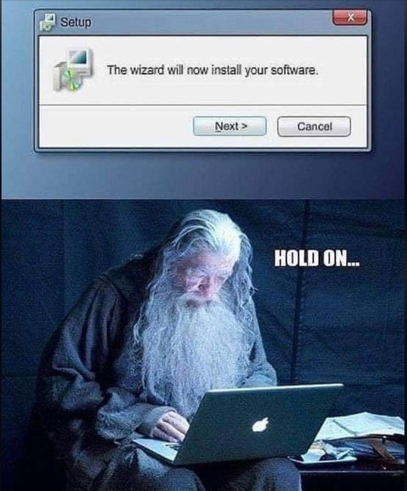 A meme of Ian Mckellen, dressed as Gandalf, looking at his Mac laptop. A setup box at the top reads: "the wizard will now install your software."