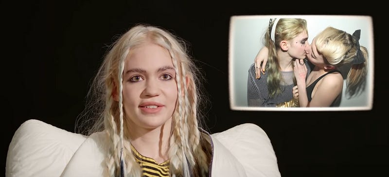 Grimes Admits to Blackmail, Extortion, and Hacking in Vanity Fair Video Interview