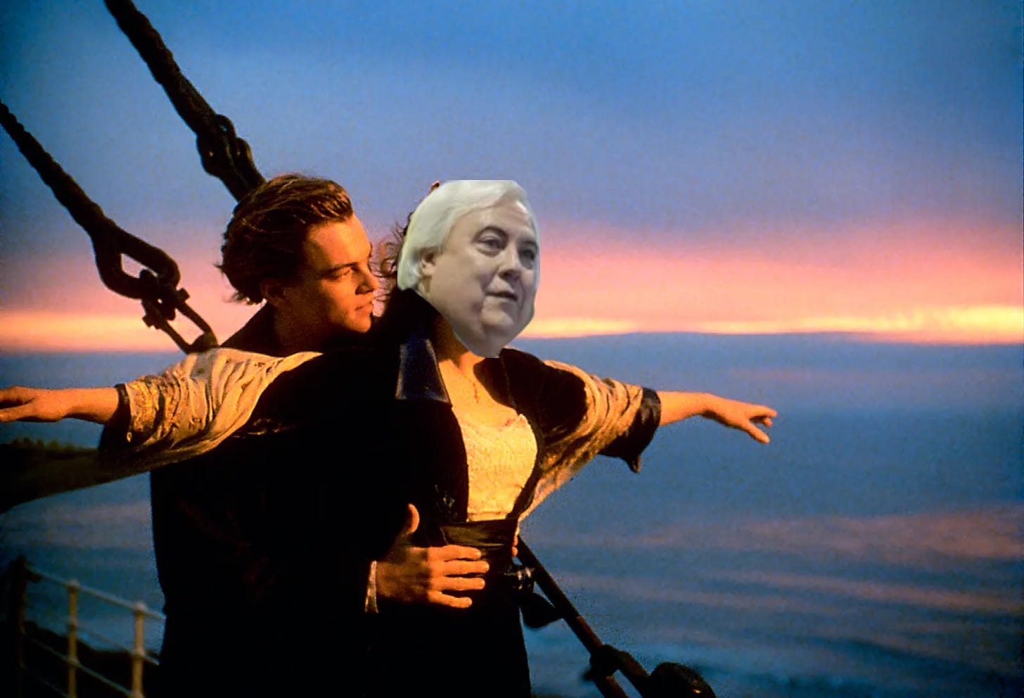 The bow of the boat scene from Titanic with Jack holding Rose with her arms outstretched, but with Clive Palmer's face over Rose's