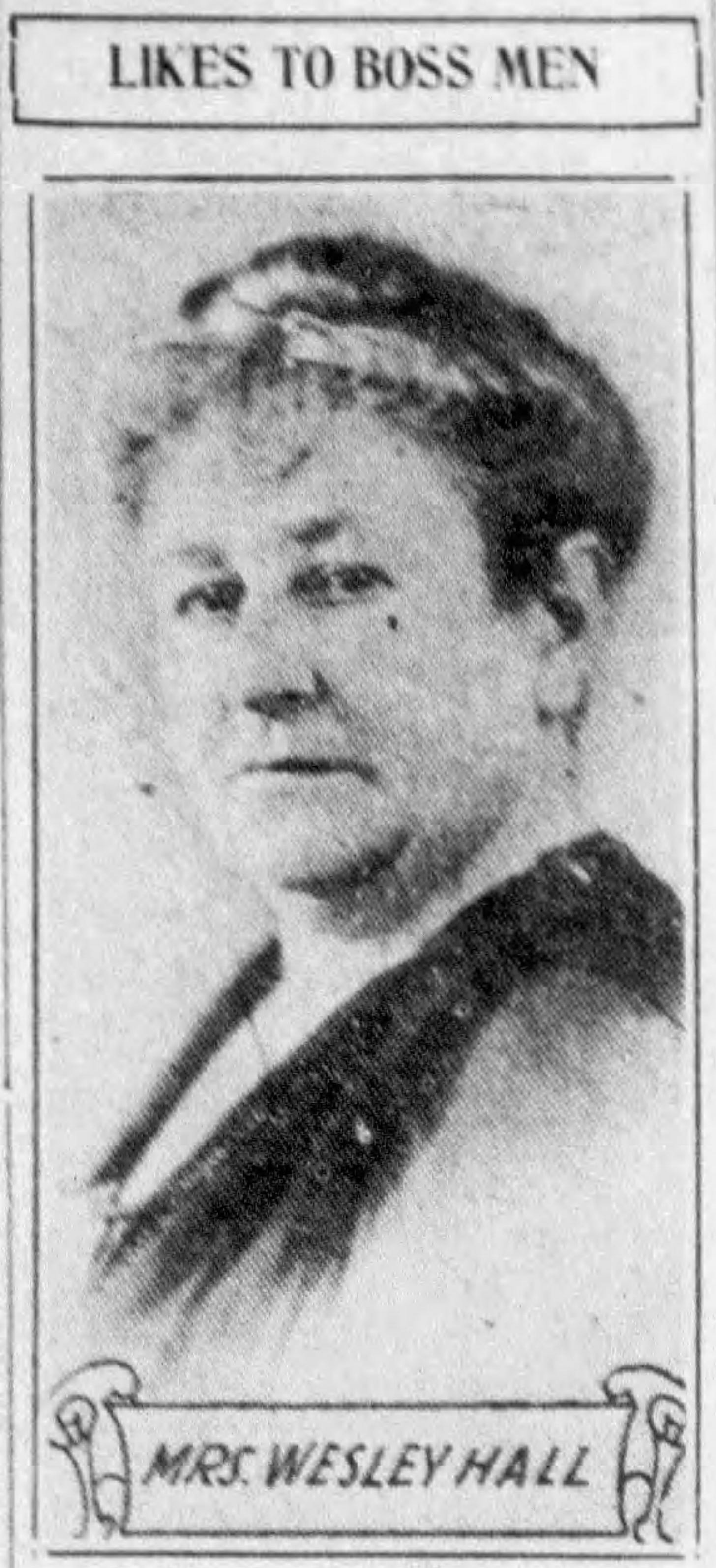 Image is a photograph from a newspaper of Lydia Hall, aka Mrs. Wesley Hall. Above her likeness is the caption "Likes to Boss Men."