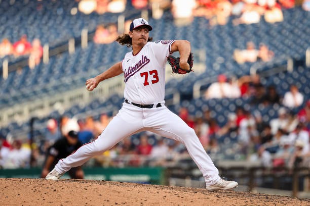 Hunter Harvey of the Washington Nationals pitches against the Boston Red Sox during the eighth inning at Nationals Park on August 17, 2023 in...