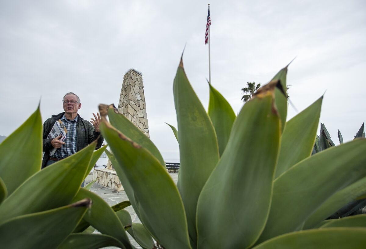 Bill Hoffman talks about the drought-tolerant vegetation near Monument Point in Heisler Park on Tuesday.