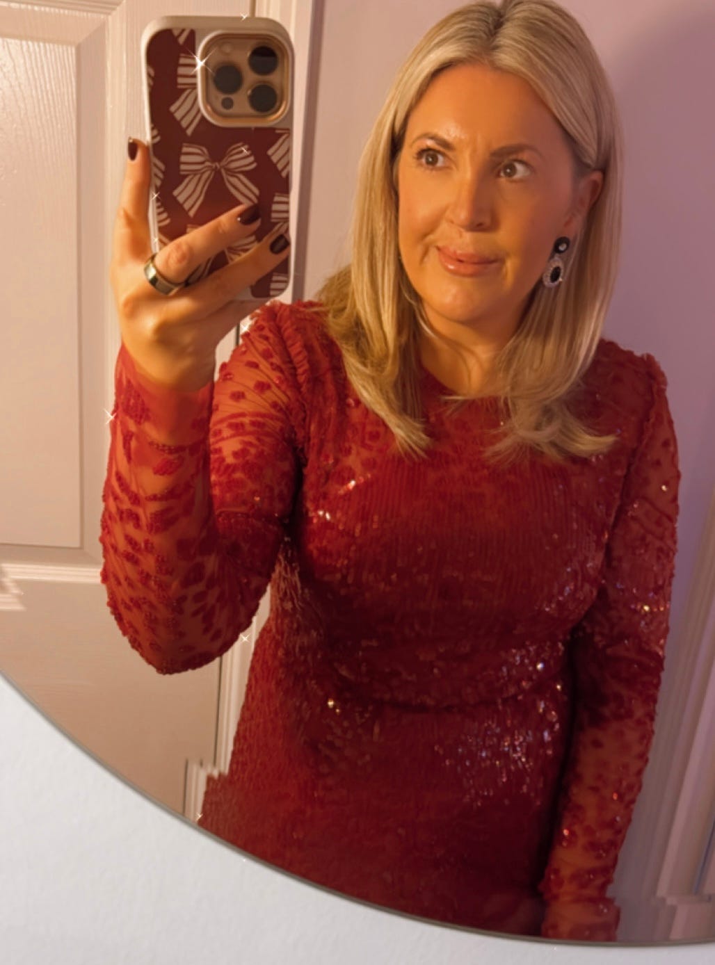 Leanne Bayley from HELLO! wearing a Needle & Thread embellished red dress as seen on the Princess of Wales