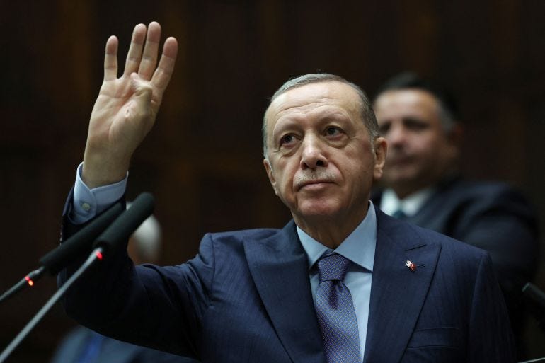 Turkish President Tayyip Erdogan greets members of parliament from his ruling AK Party (AKP) during a meeting at the Turkish parliament in Ankara, Turkey, October 25, 2023. Murat Cetinmuhurdar/PPO/Handout via REUTERS THIS IMAGE HAS BEEN SUPPLIED BY A THIRD PARTY. NO RESALES. NO ARCHIVES