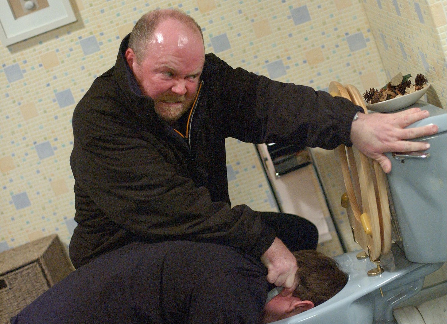 An episode of EastEnders where Phil Mitchell flushes Ian Beale's head down the toilet