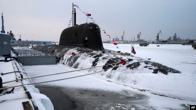 The newly built nuclear submarine The Krasnoyarsk is seen after a flag-raising ceremony on Monday for newly built nuclear submarines at the Sevmash shipyard in Severodvinsk in Russia's Archangelsk region, Dec. 11, 2023.