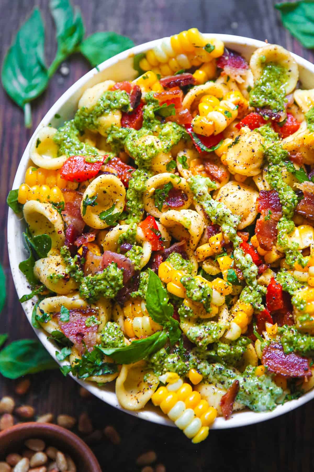 Corn Pasta Salad with Bacon and Creamy Pesto Dressing in a bowl