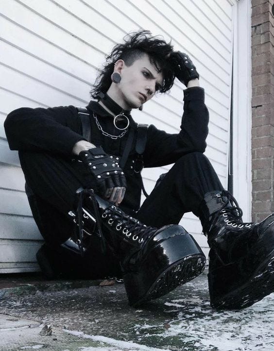 This is @punk_noir, a big goth / punk fashion influencer on Instagram. https://www.pinterest.com/pin/1548181151953024/