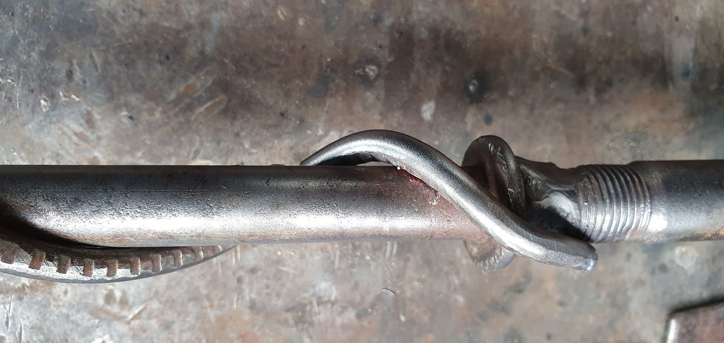 Welded bolts reinforced by twisted 6mm rod wound around like a vine
