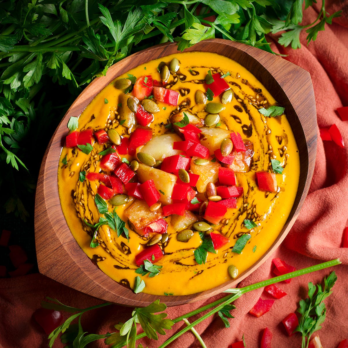 A bowl of roasted carrot soup.