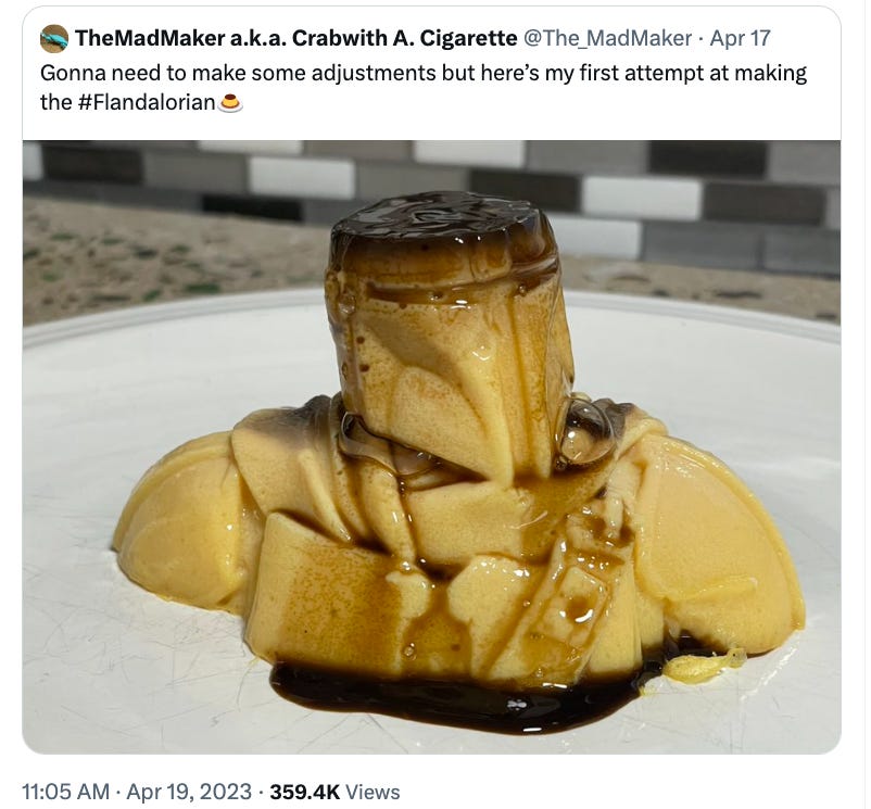 A flan fashioned in the shape of the helmeted head and shoulders of The Mandalorian