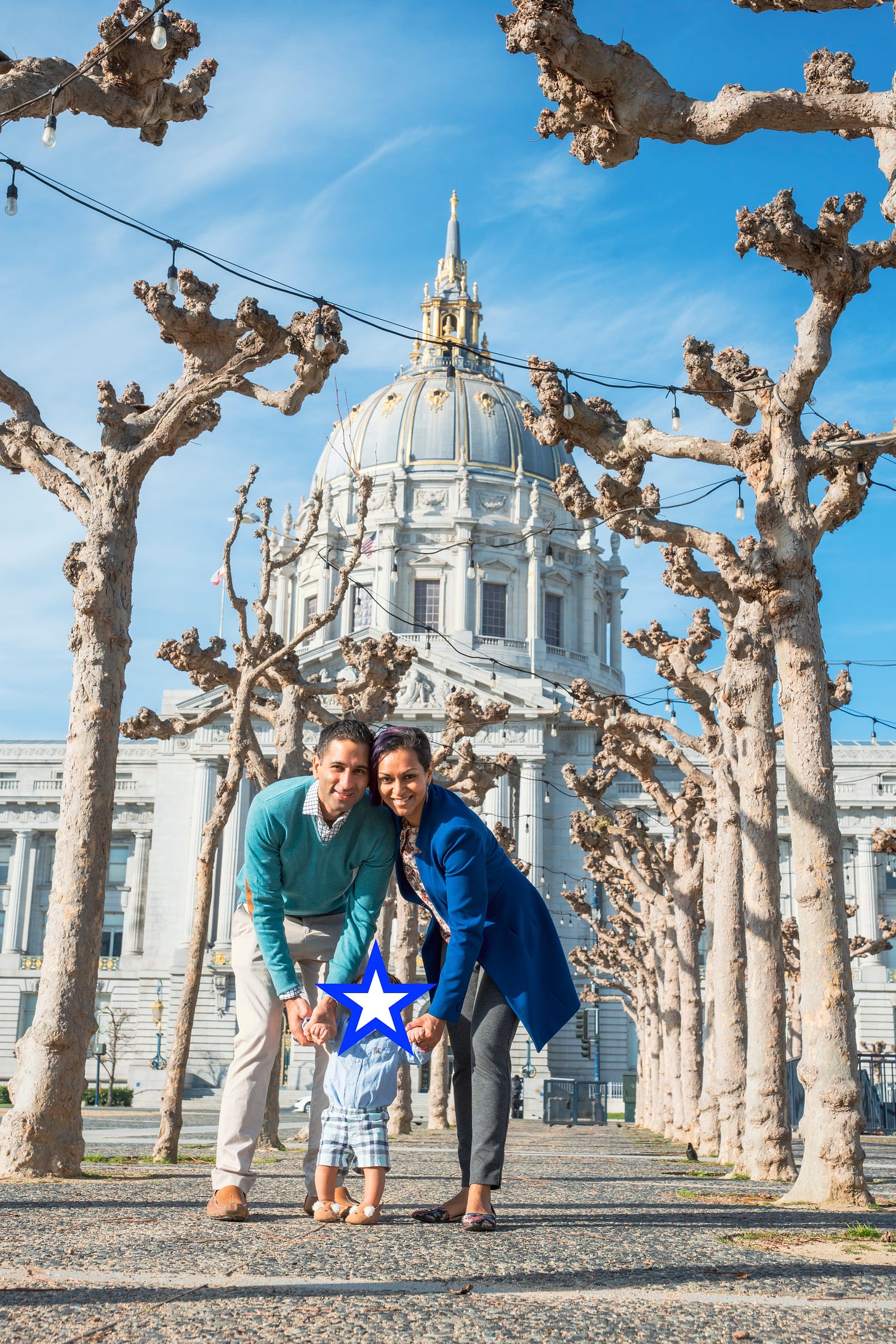 Devika with her husband Ashish and son Rum in front of San Francisco's City Hall